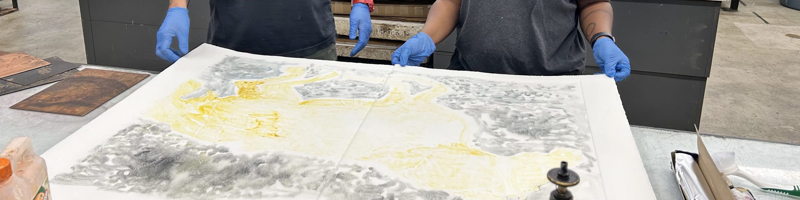 hands holding a print